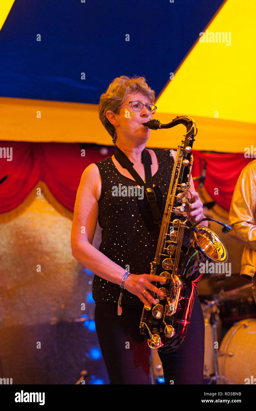 woman playing the saxophone at the Bearded theory festival Stock Photo