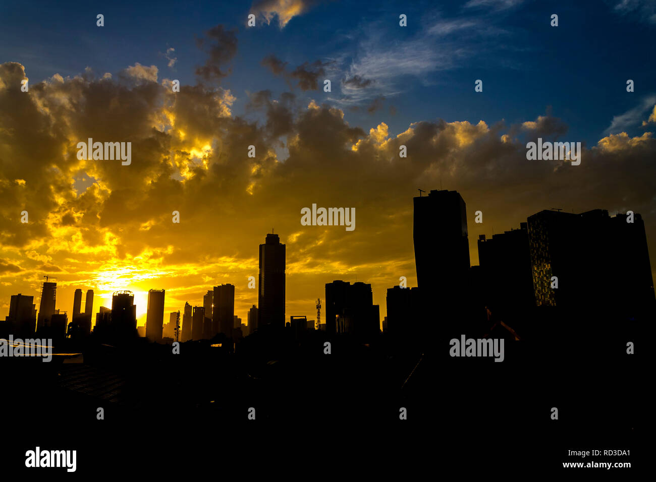 City skyline at sunset, Jakarta, Indonesia Stock Photo