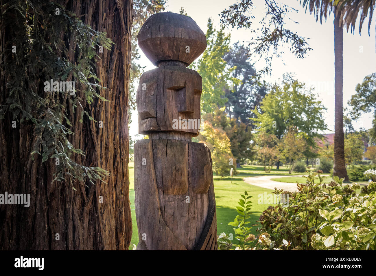Chemamull wood statue of mapuche culture at Undurraga Vineyard -  Santiago, Chile Stock Photo