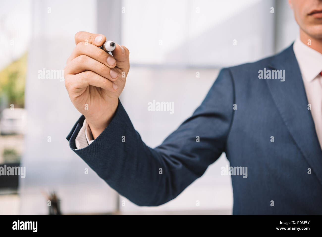 Businessman marker writing something hi-res stock photography and ...