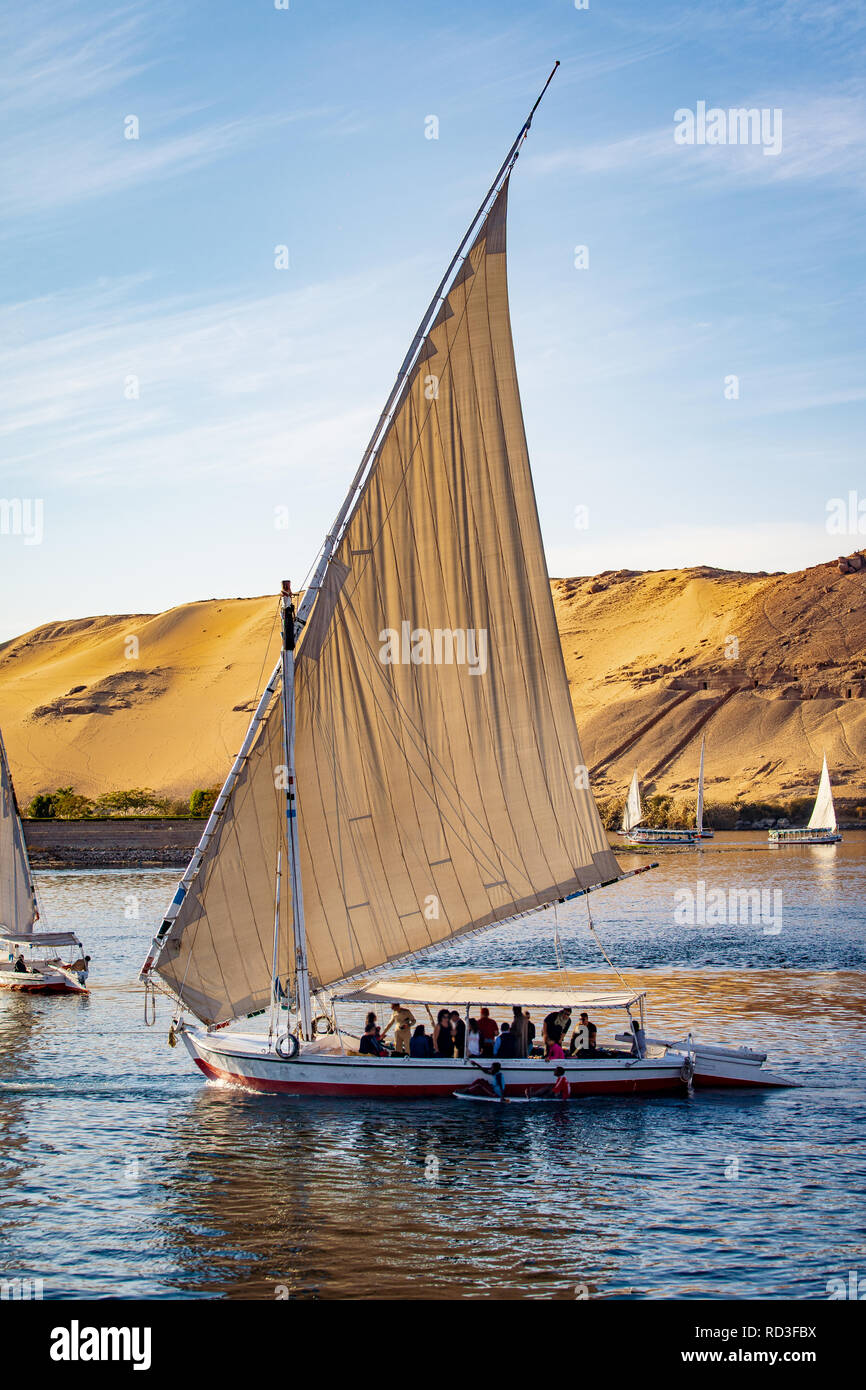 Tourists in a Felucca boat on the Nile River in Luxor Thebes Stock ...