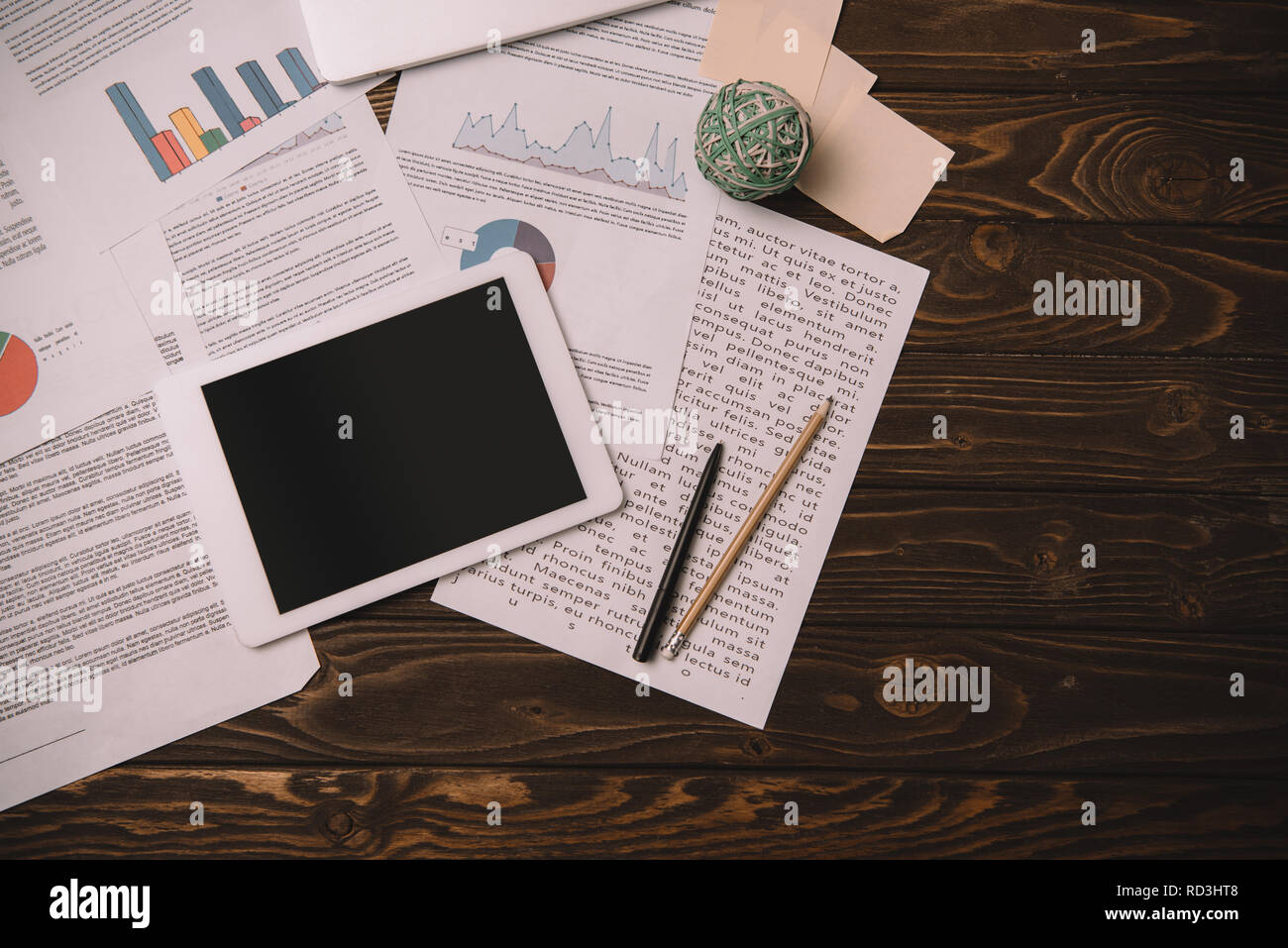 top view of digital tablet and paperwork on workplace Stock Photo - Alamy