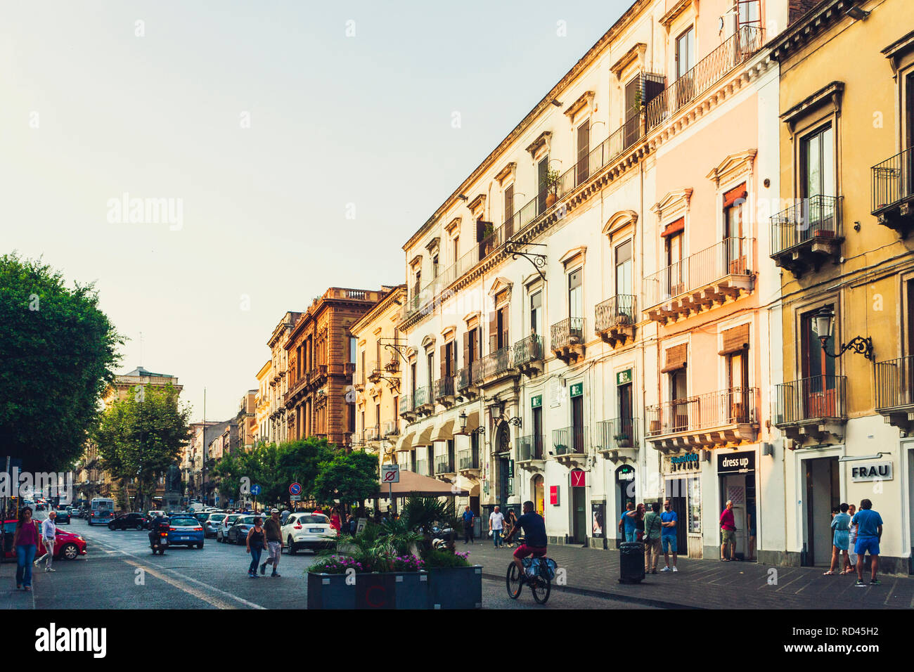Catania, Sicily – august 9, 2018: people walking on historical street