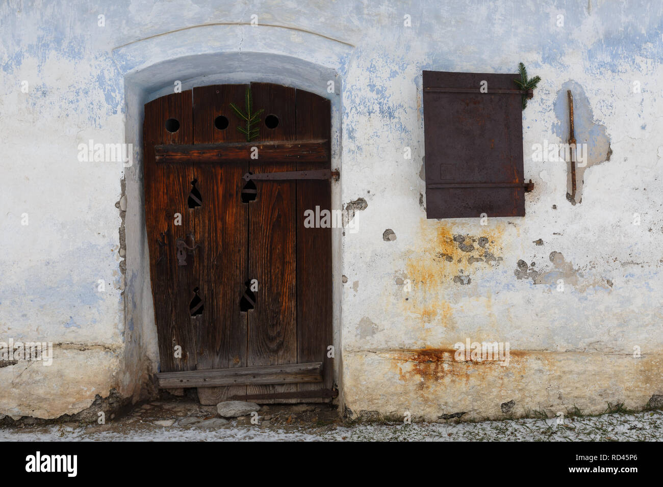 Traditional Christmas Decoration On Window And Door Of A