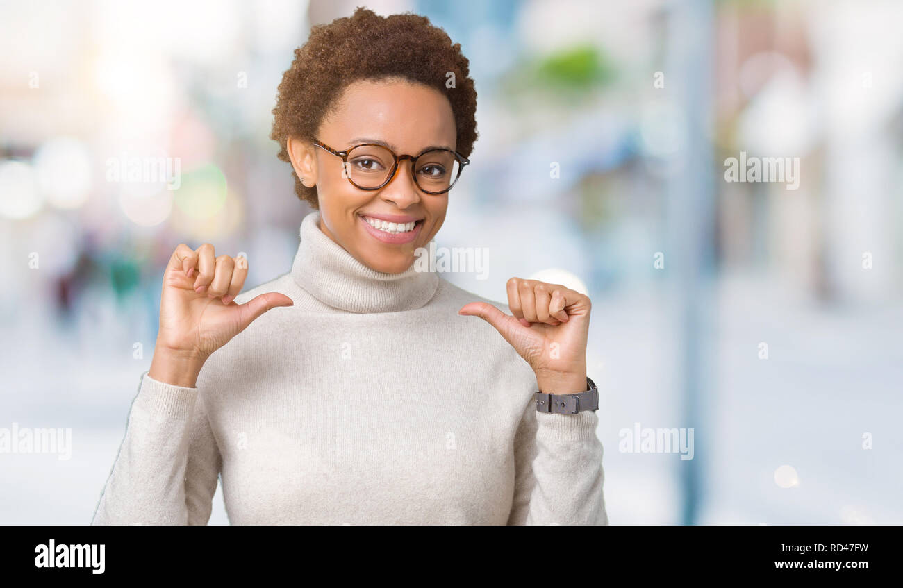 Young beautiful african american woman wearing glasses over isolated ...