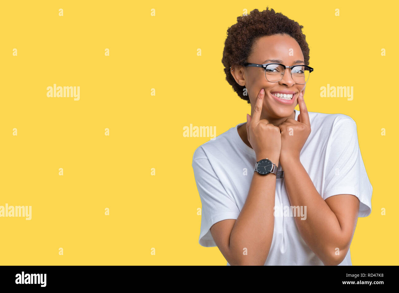 Beautiful young african american woman wearing glasses over isolated ...