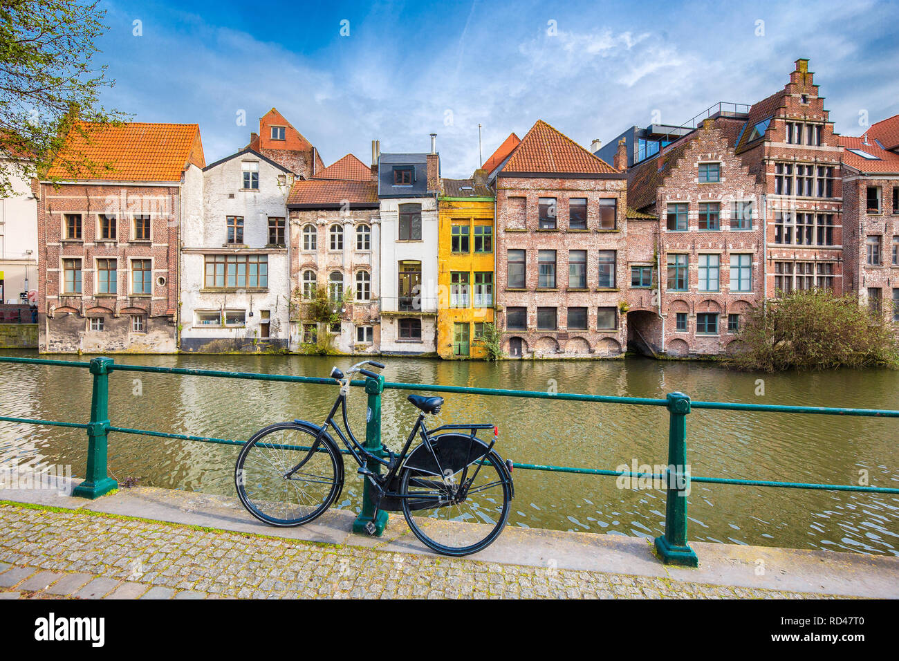 Beautiful view of the historic city of Ghent with traditional colorful buildings and old bicycle, Flanders region, Belgium Stock Photo