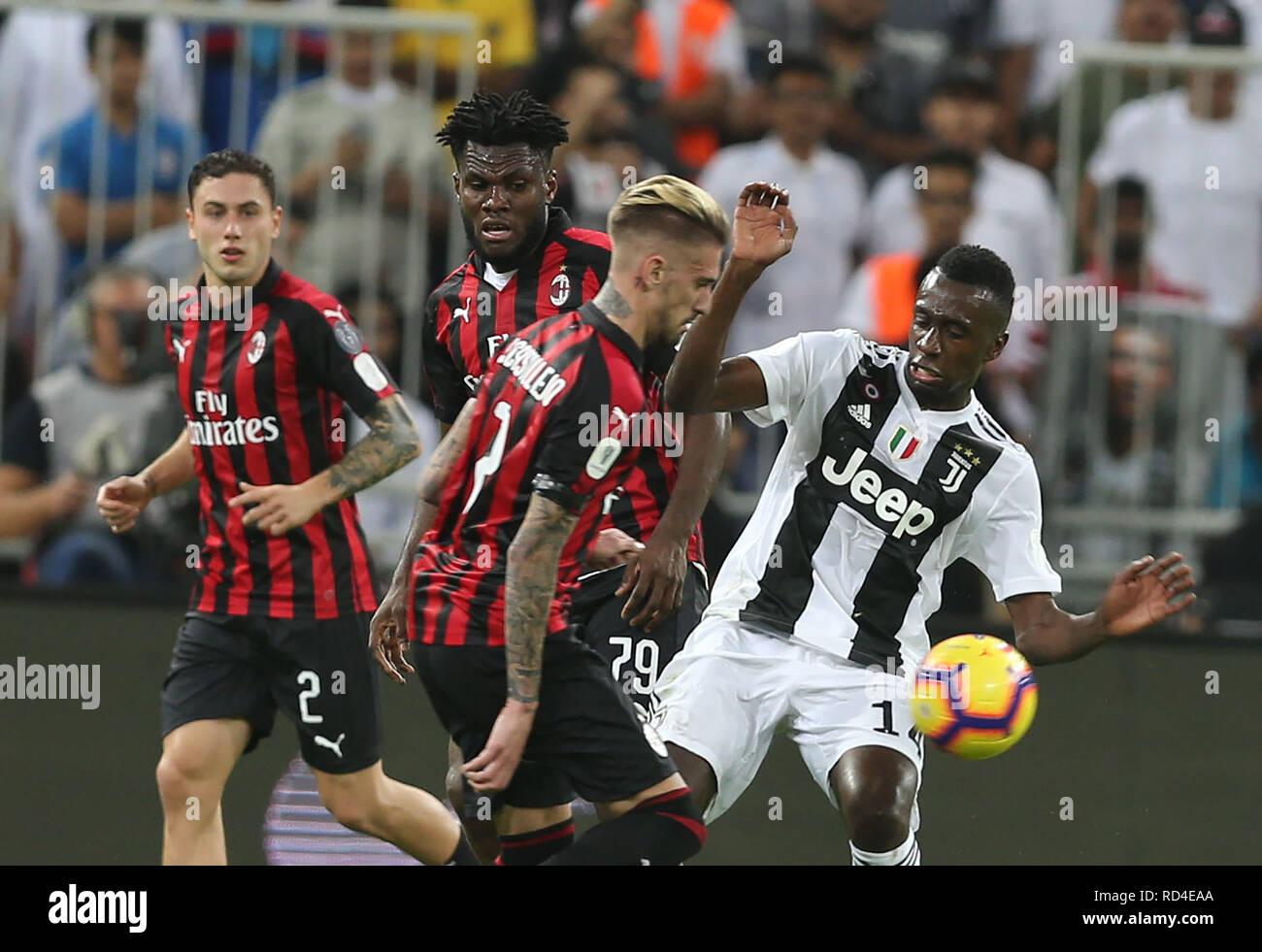 Jeddah, Saudi Arabia. 16th Jan, 2019. Milan's Cristian Zapata (2-R) and Franck Kessie (3-R) battle for the ball with Juventus' Blaise Matuidi during the Italian Super Cup final soccer match between Juventus and AC Milan at the King Abdullah Sports City Stadium. Credit: -/dpa/Alamy Live News Stock Photo