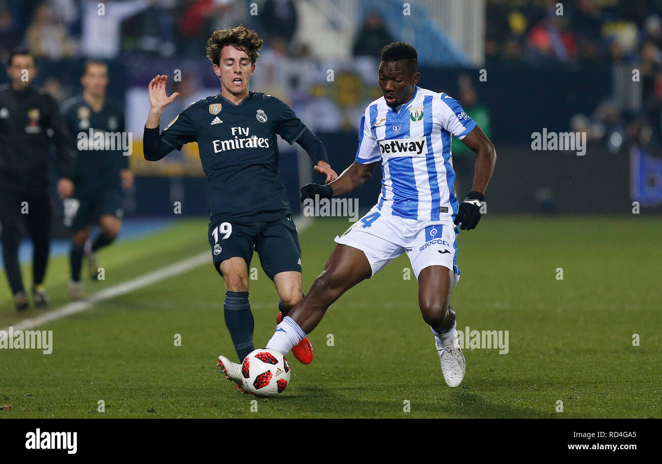 Alvaro Odriozola (Real Madrid) competes for the ball with Kenneth Omeruo (CD Leganes) during the Copa del Rey Round of 8 second leg match between CD Leganes and Real Madrid CF at Butarque Stadium in Leganes, Spain. (Final score CD Leganes 1 - Real Madrid 0) Stock Photo
