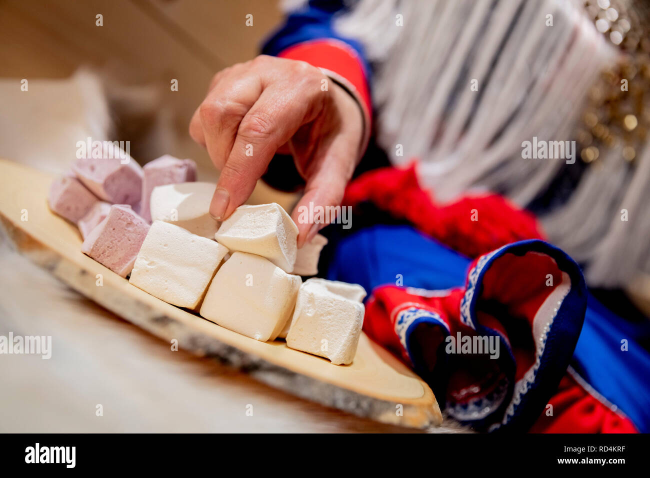 Berlin, Germany. 17th Jan, 2019. Maritta Autio, chef from Sodankylä in Finland, will take a marshmallow with the taste of cloudberry at the International Green Week 2019 in the Hall of Finland. The Fair for Food, Agriculture and Horticulture (18-27 January) took place for the first time in Berlin in 1926. The partner country this year is Finland. Credit: Christoph Soeder/dpa/Alamy Live News Stock Photo