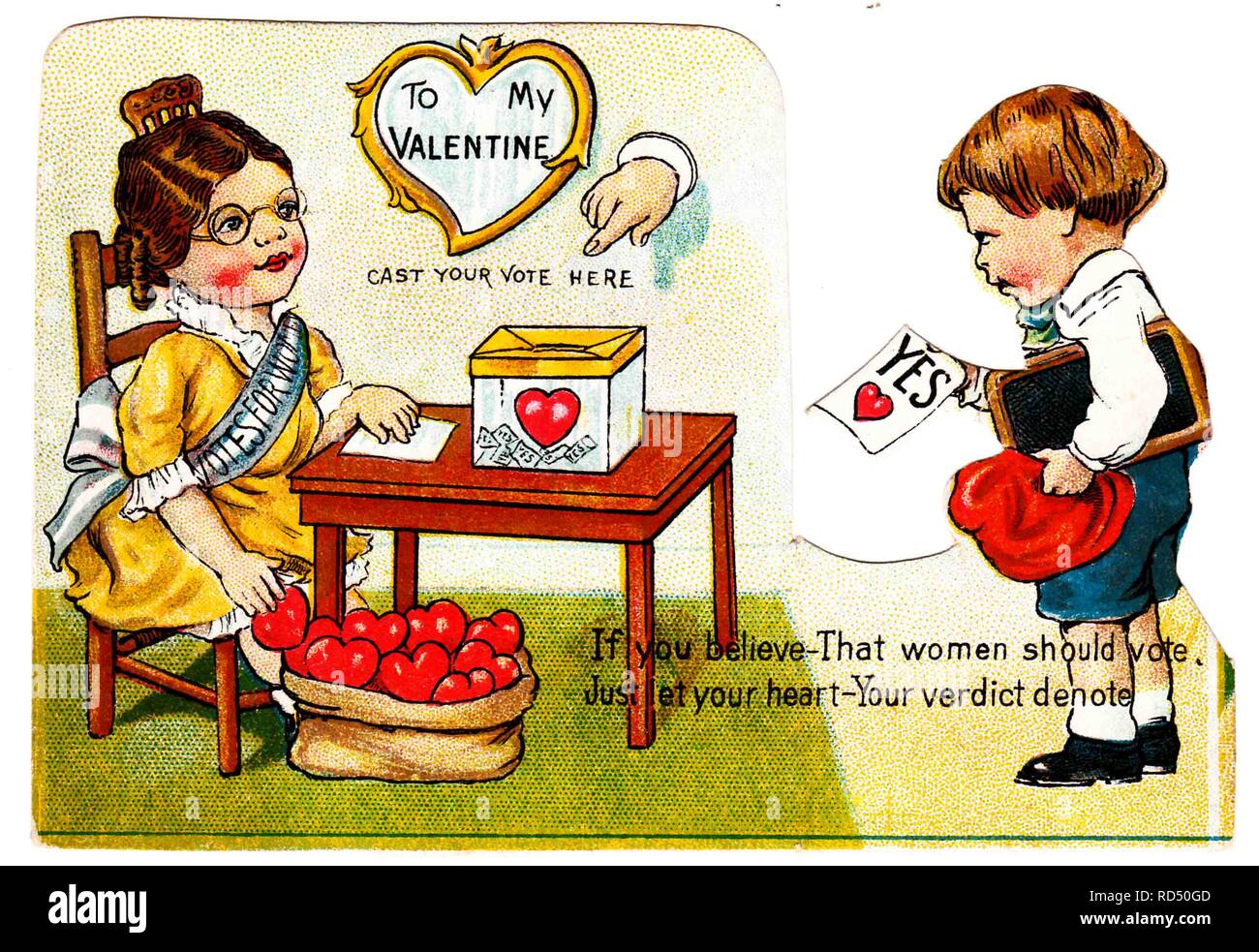 Suffrage-era, die-cut Valentine card, depicting a small schoolboy bringing his teacher a valentine marked 'Yes, ' illustrating his support for her right to vote; his spectacled teacher, wearing a yellow dress and a 'Votes for Women' sash, sits at a table with a ballot box, and draws a heart from a sack at her feet; with the text 'If you believe - That women should vote, Just let your heart - Your verdict denote', 1900. () Stock Photo