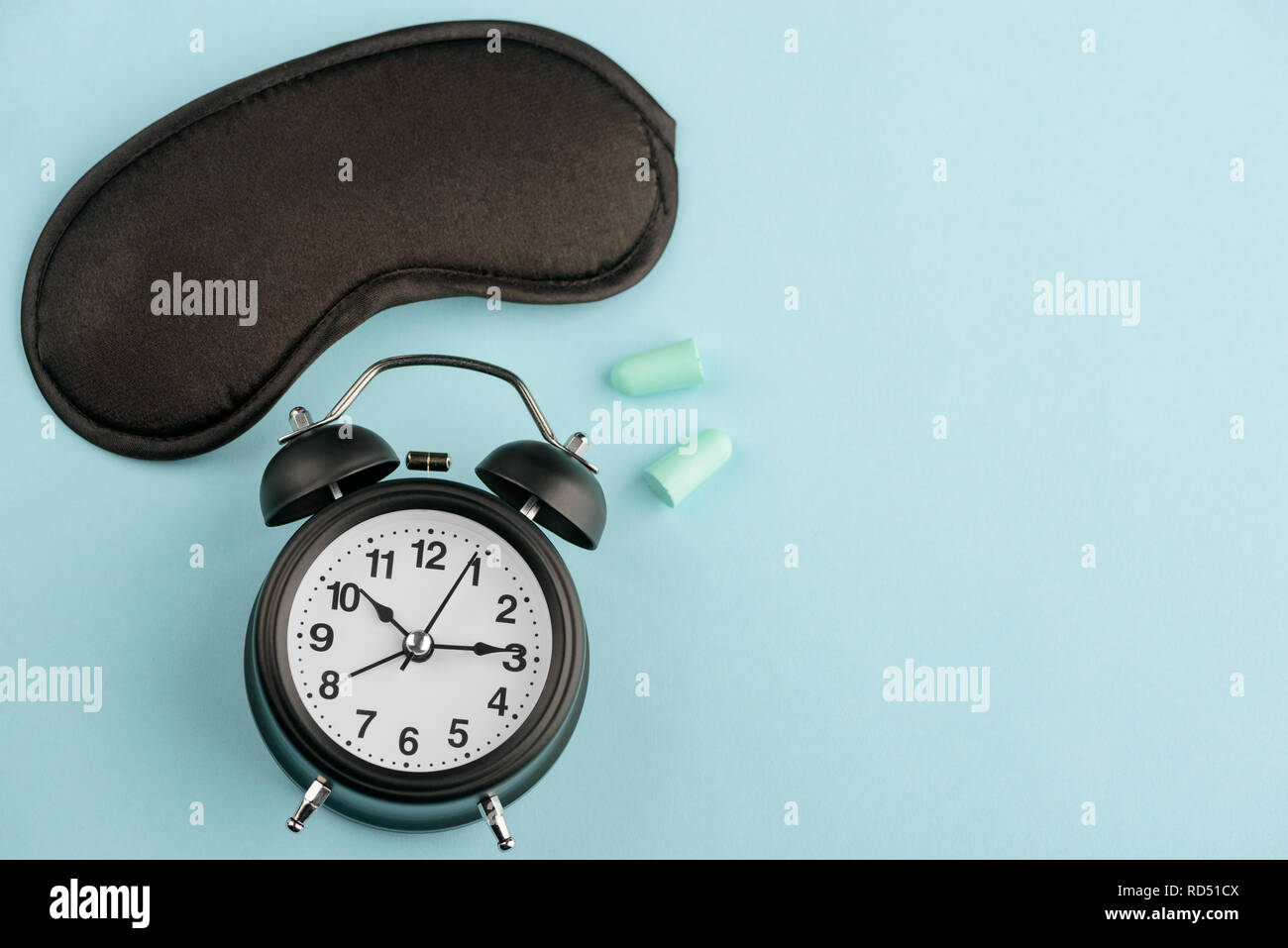 Mask, alarm clock and earplugs Stock Photo Alamy