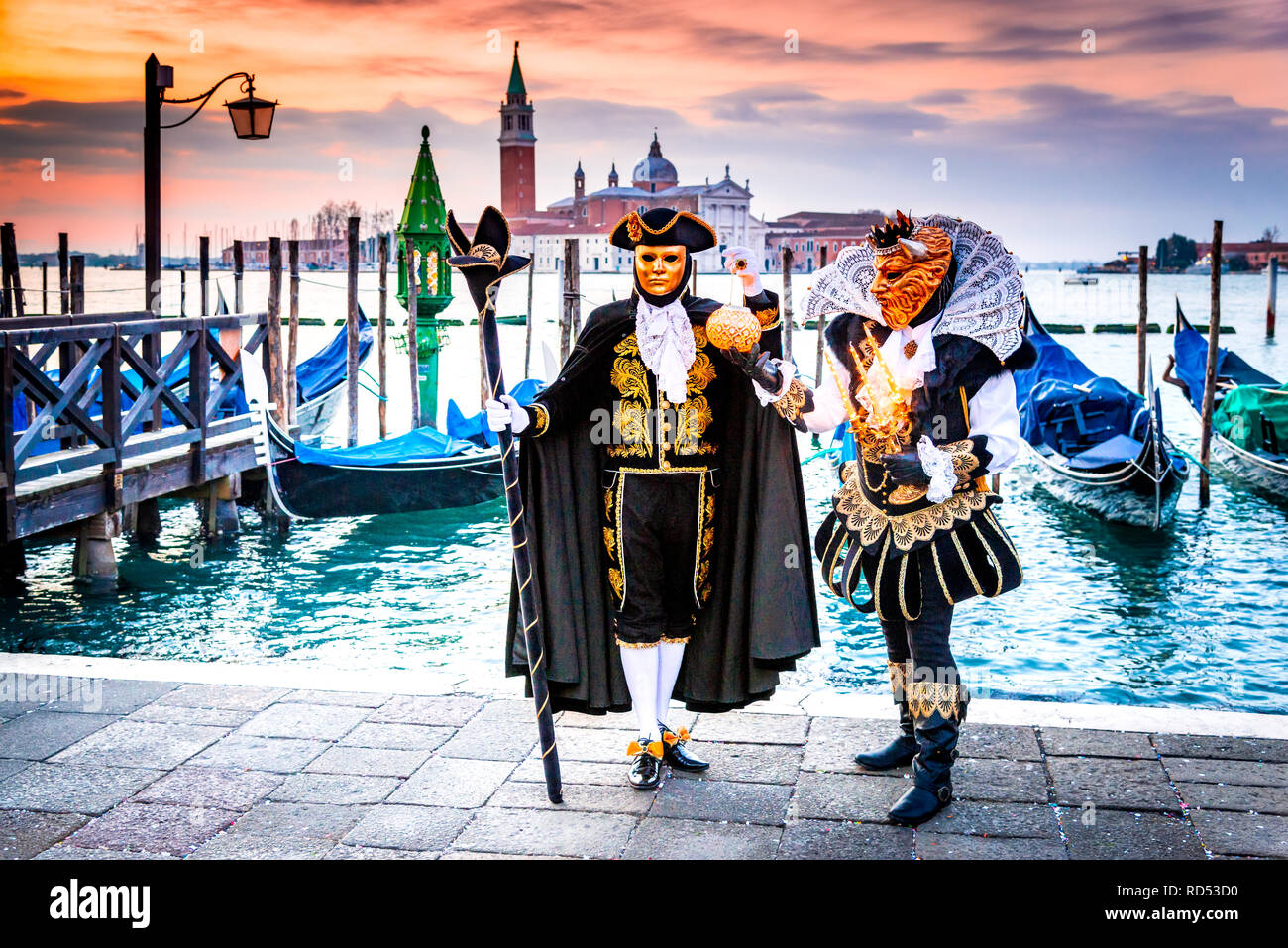 Venice, Carnival of Venice with beautiful mask at Piazza San Marco and Grand Canal, Italy Stock Photo
