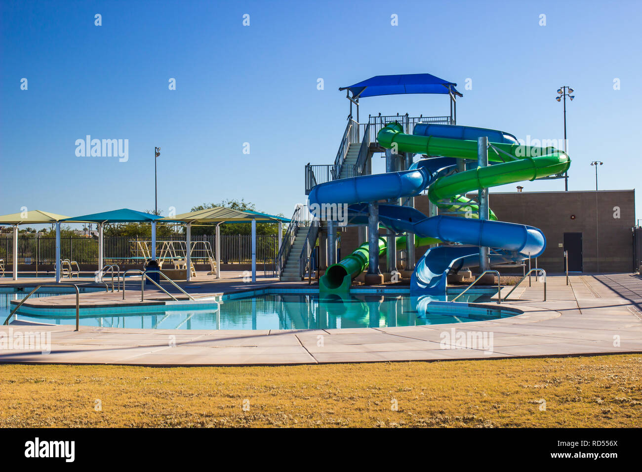 Swimming Pool Complex With Tube Slides And Umbrellas Stock Photo Alamy