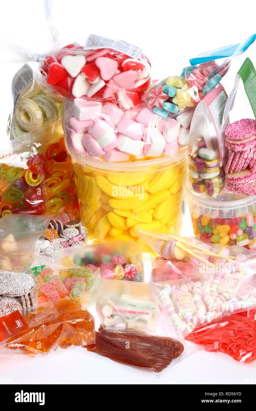 Clear plastic bags with a variety of fruit gums, marshmallows, candies