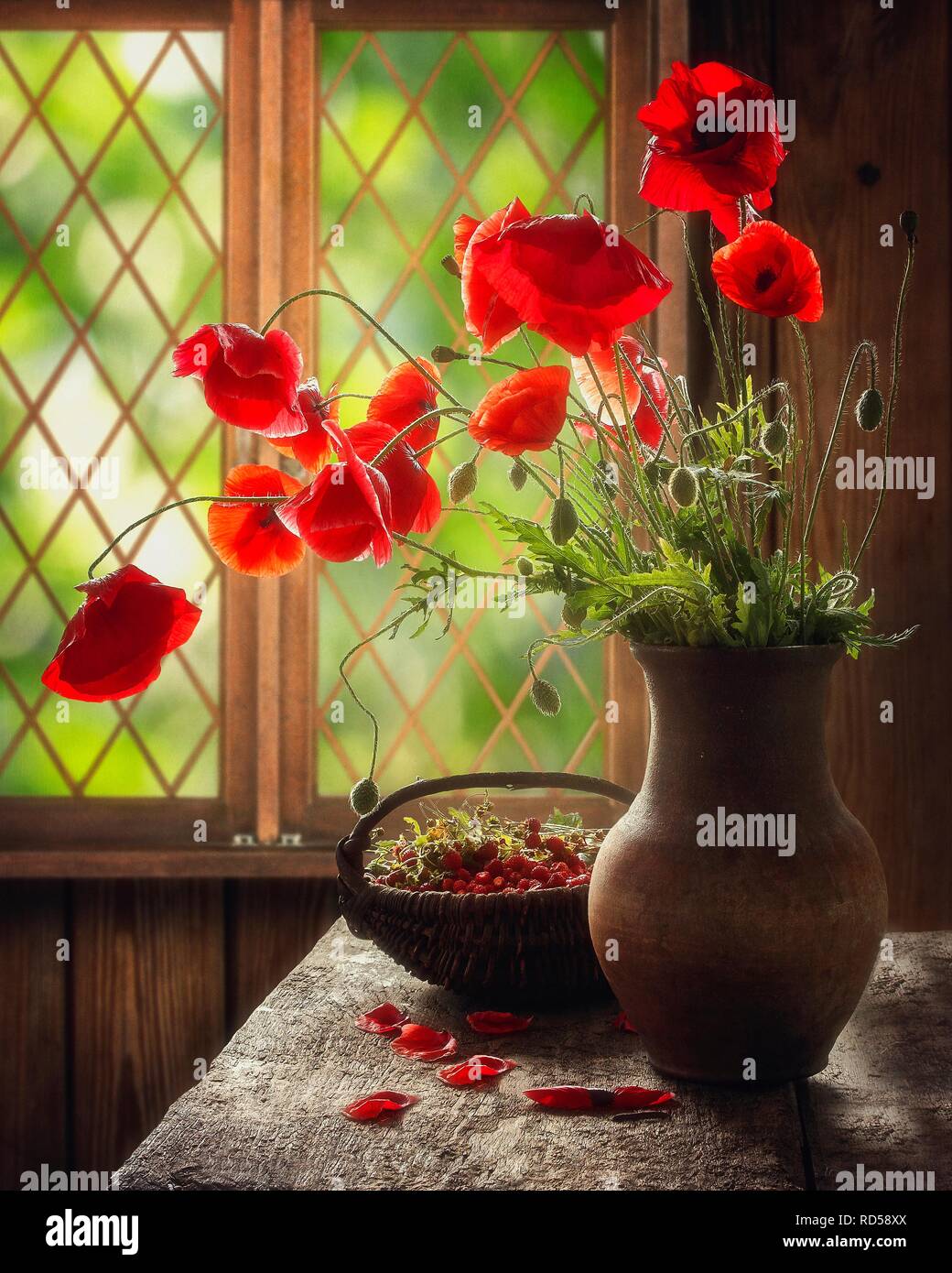Still life with bouquet of red poppies Stock Photo - Alamy