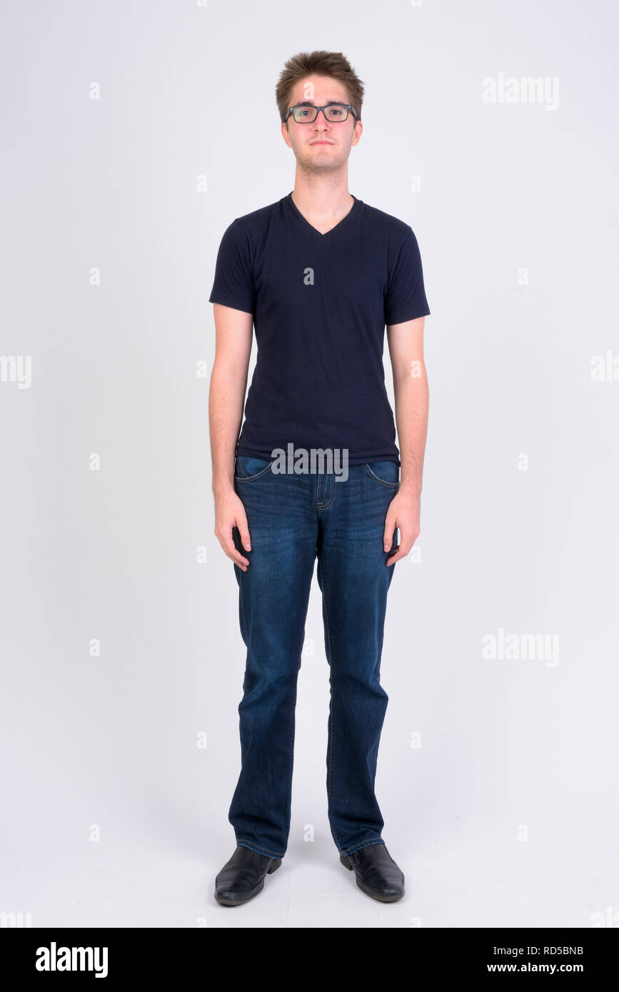 Full body shot of young handsome man wearing eyeglasses Stock Photo - Alamy