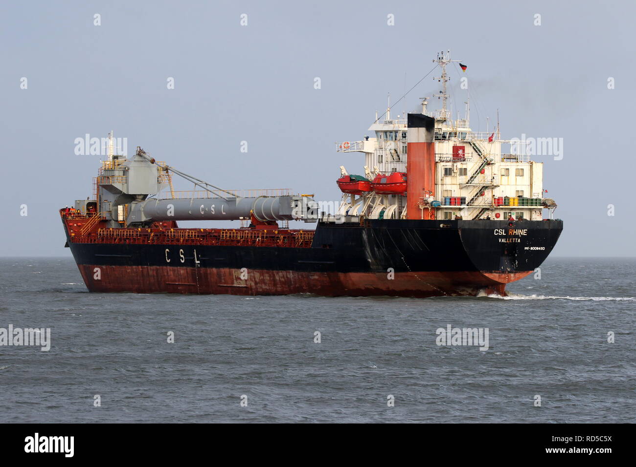 The bulk carrier CSL Rhine leaves the port of Cuxhaven on December 30, 2018. Stock Photo
