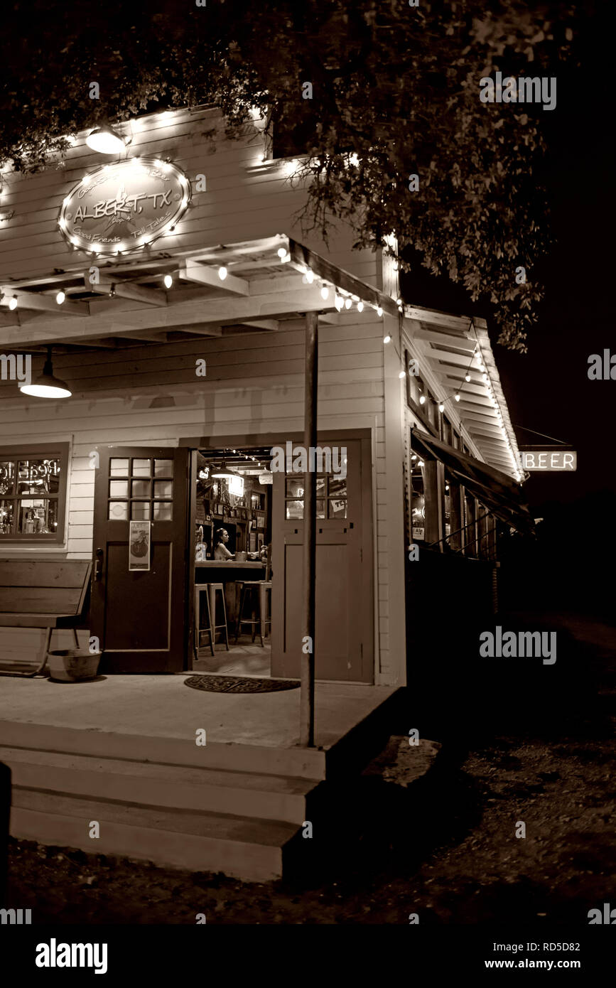 Small town bar at night with patio lights, Albert, Texas USA Stock