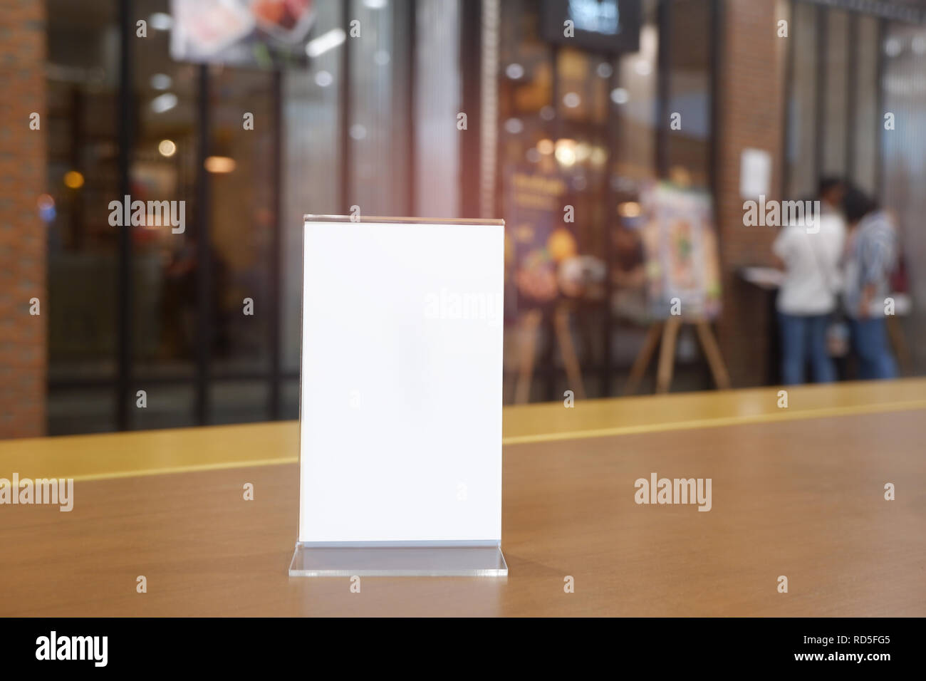 Menu frame standing on wood table in Bar restaurant cafe. space for text marketing promotion - Image Stock Photo