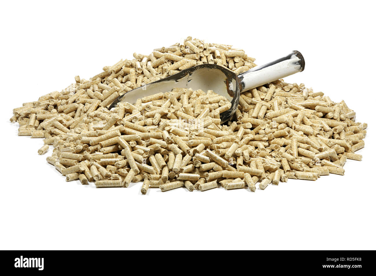 vintage enamel scoop with wood pellets isolated on white background