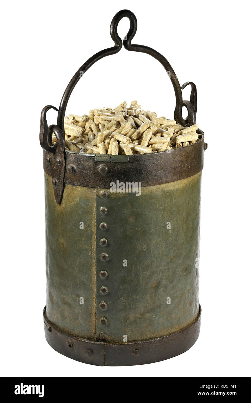 vintage bucket with wood pellets isolated on white background Stock
