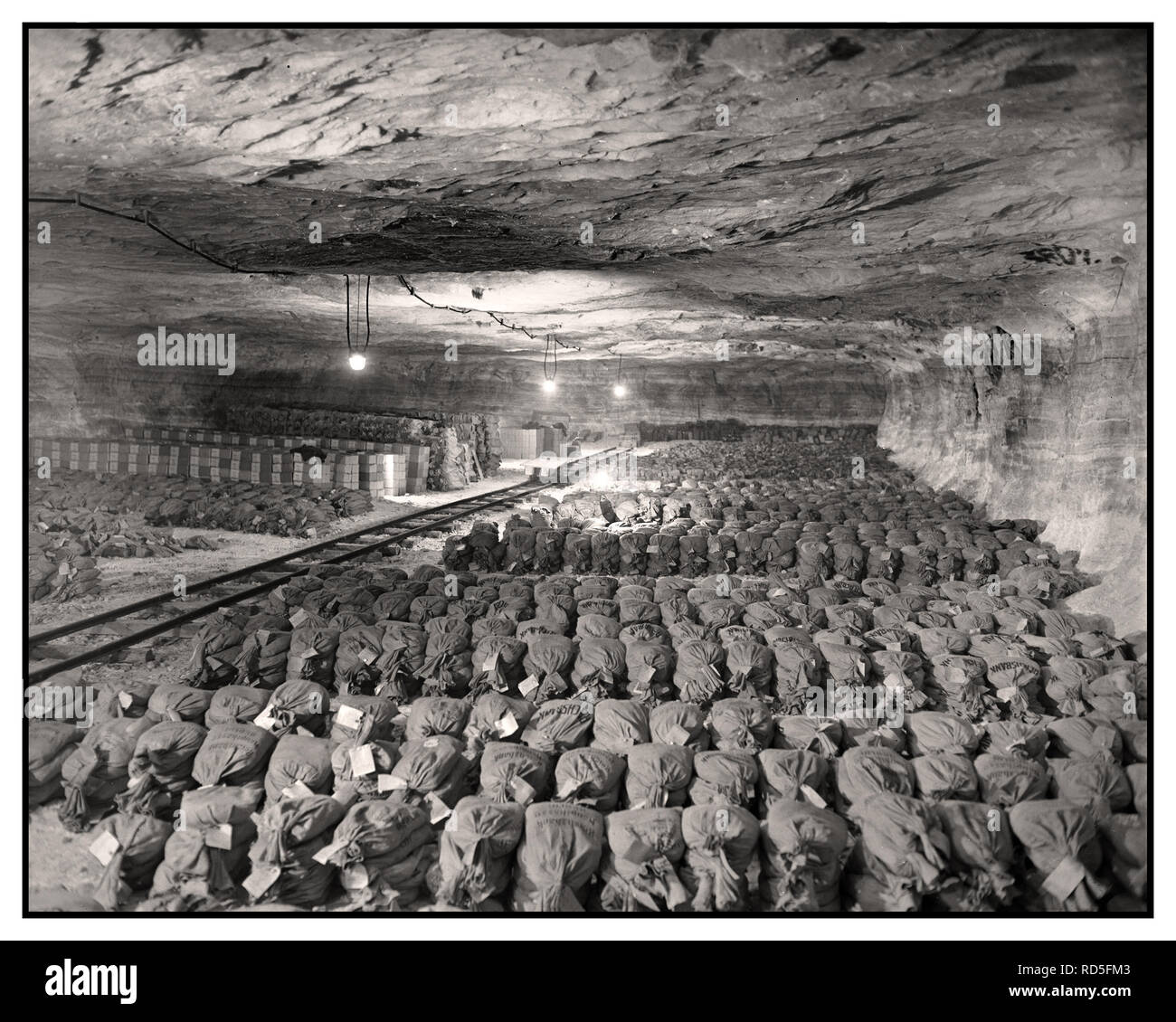 NAZI LOOT GOLD ART Hidden hoard stashed secreted in a salt mine in Merkers. The 90th Division, U.S. Third Army, discovered this Third Reich wealth, SS looted gold money and museum art paintings that were removed from Nazi Berlin and secreted in a salt mine vault in Merkers, Germany 1945 Stock Photo