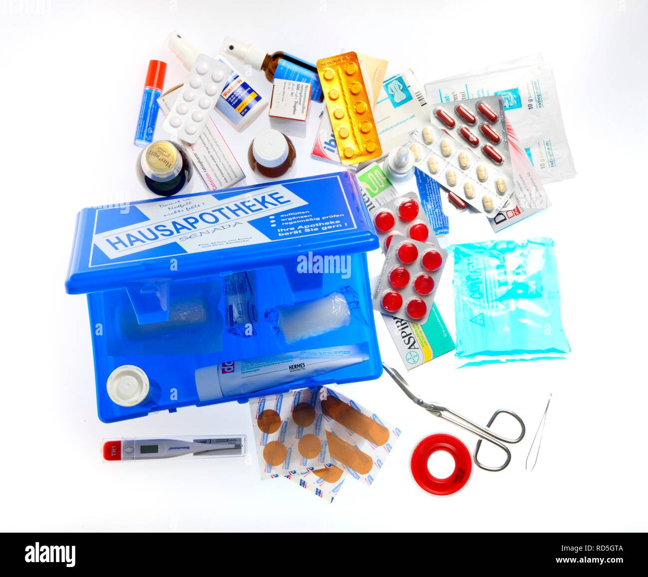 Home medicine chest with a selection of medicines and dressing material Stock Photo