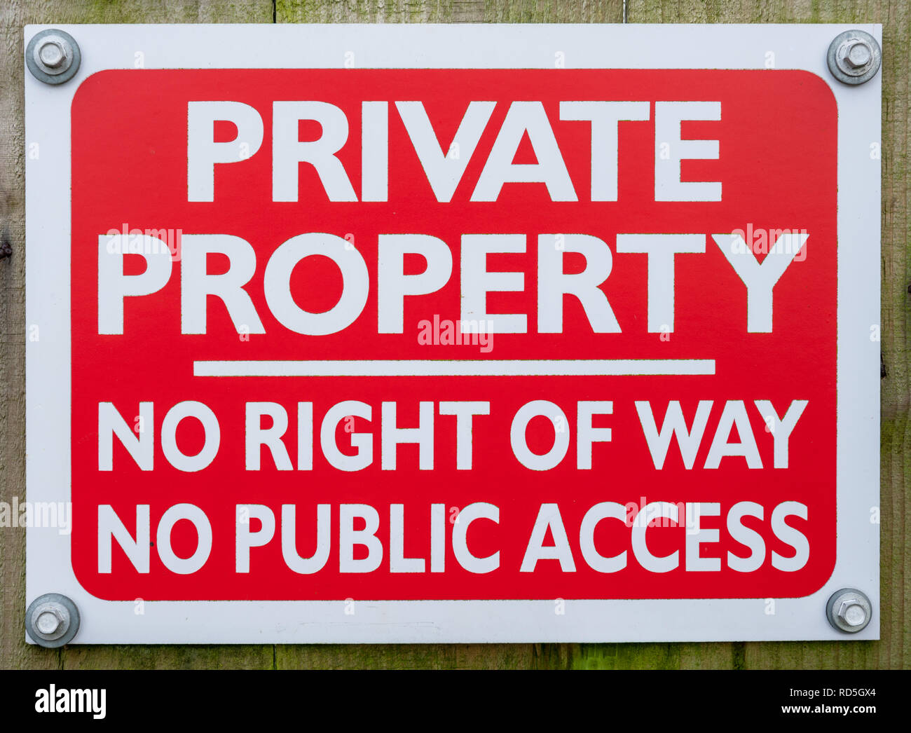 Private Property sign - white text on red background Stock Photo