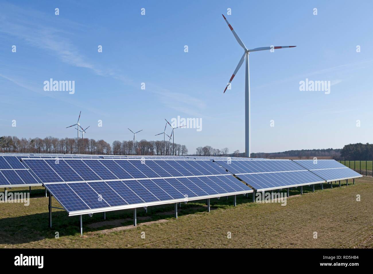 Solar farm and wind turbine near Suedergellersen near Lueneburg, Lower Saxony Stock Photo