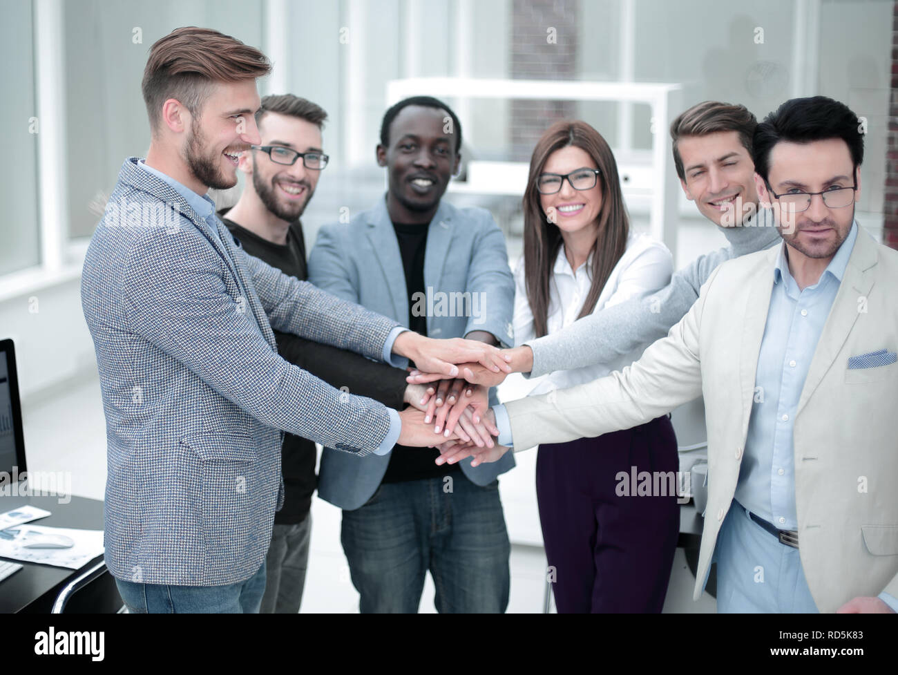 Unity In Business business team shows their unity Stock Photo - Alamy