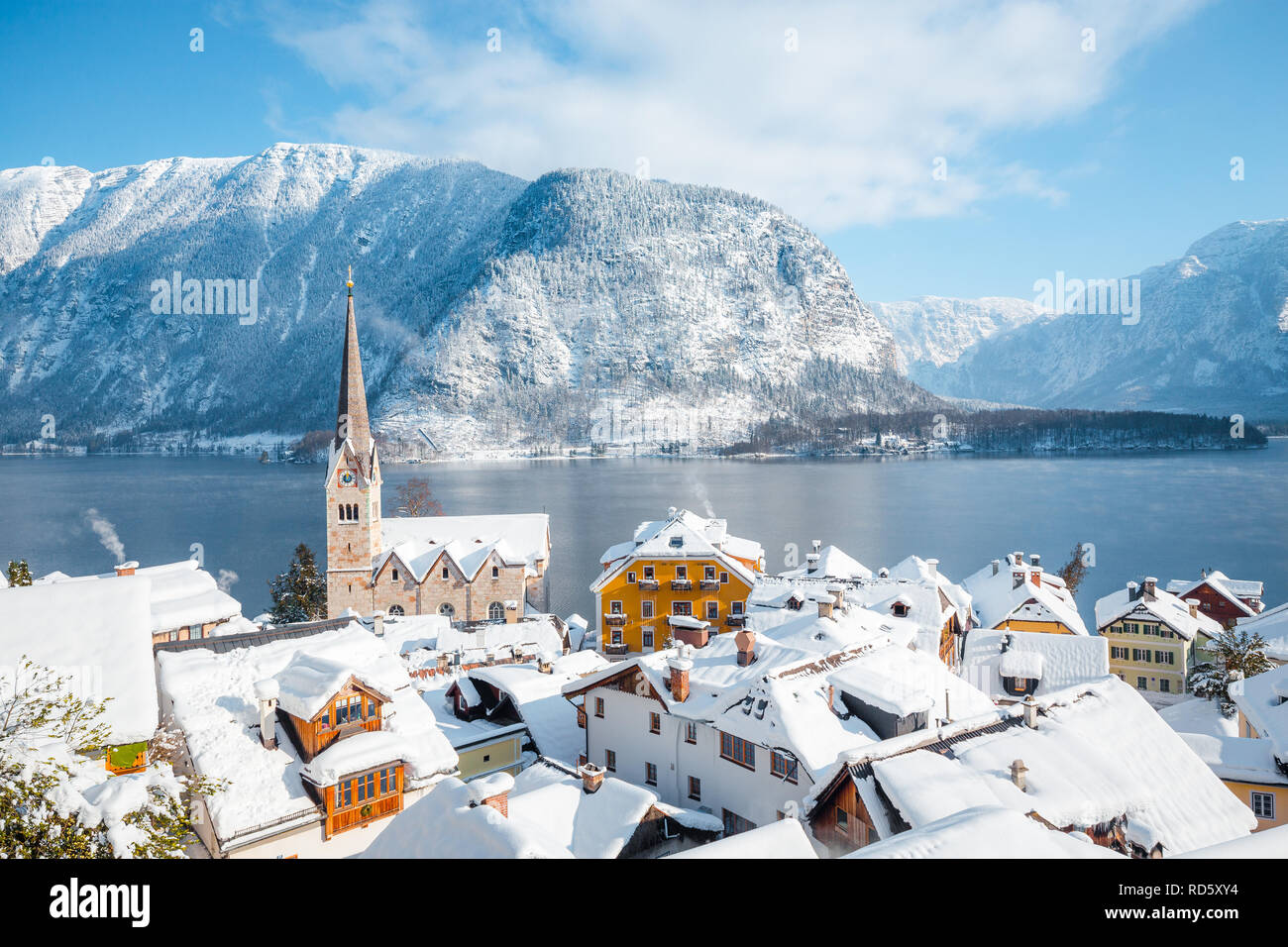 Panoramic view of the historic village of Hallstatt on a beautiful cold sunny day with blue sky and clouds in winter, Austria Stock Photo