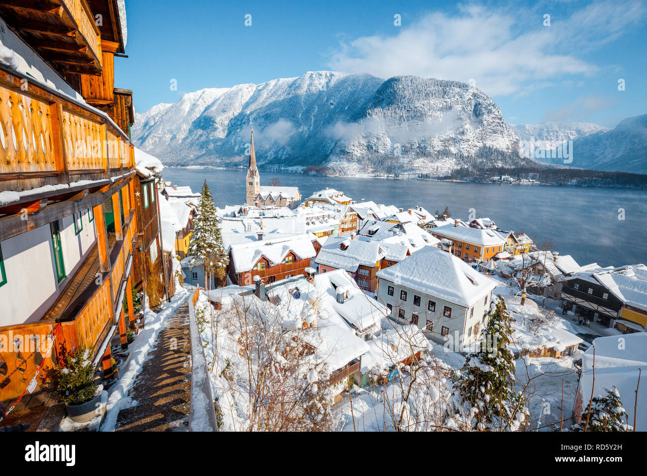 Panoramic view of the historic village of Hallstatt on a beautiful cold sunny day with blue sky and clouds in winter, Austria Stock Photo
