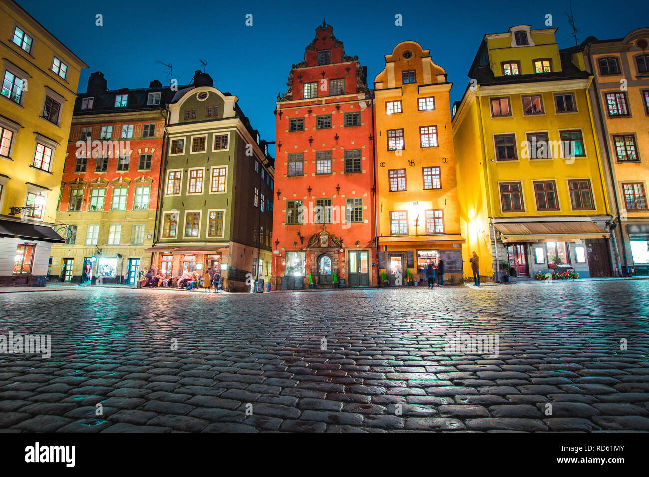 Classic view of colorful houses at famous Stortorget town square in Stockholm's historic Gamla Stan (Old Town) at night, central Stockholm, Sweden Stock Photo