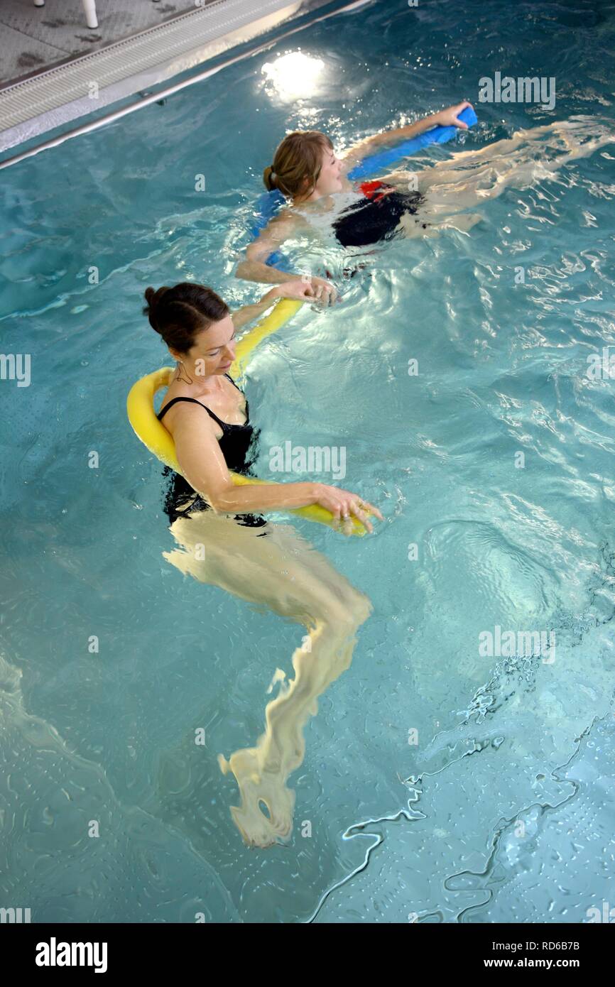 Patients doing aqua aerobics, water aerobics, exercise therapy