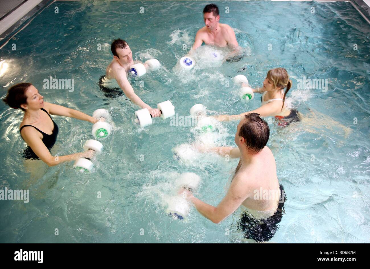 Patients doing aqua aerobics, water aerobics, exercise therapy