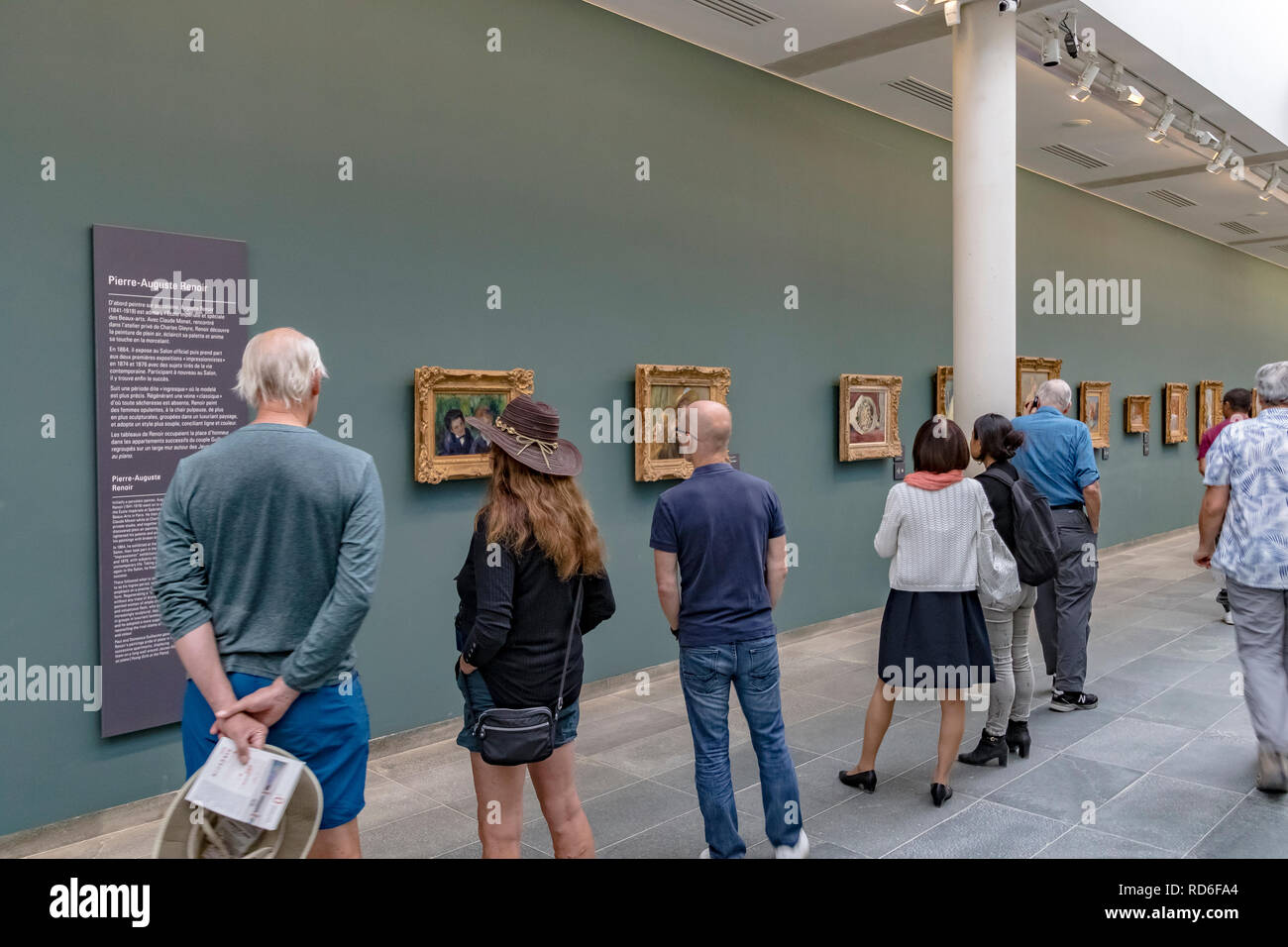 People admiring the impressionist paintings housed in The basement area of The Musée de l'Orangerie ,Paris, France Stock Photo