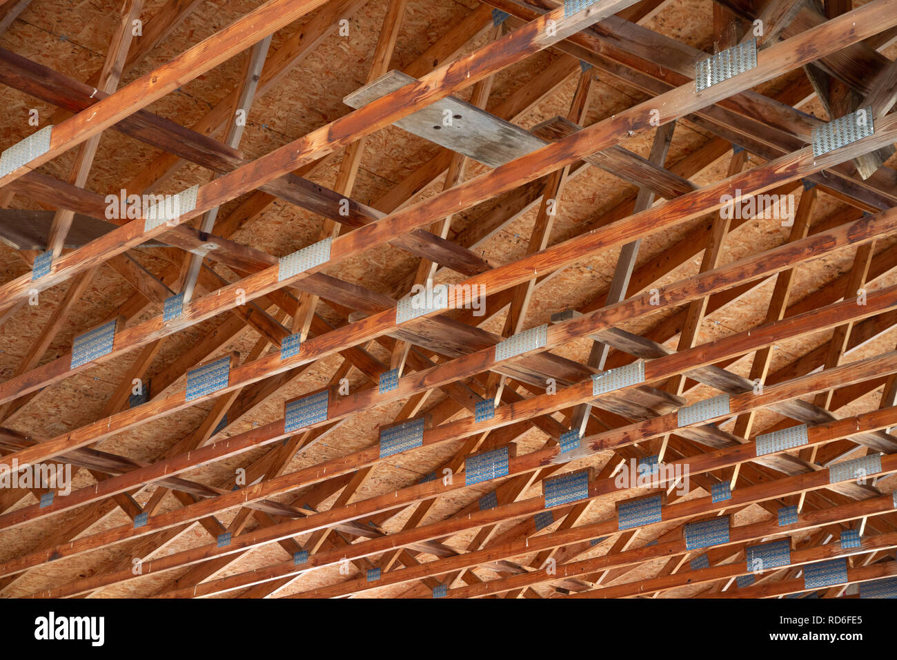 Wood Truss Ceiling with Mending Plates Stock Photo