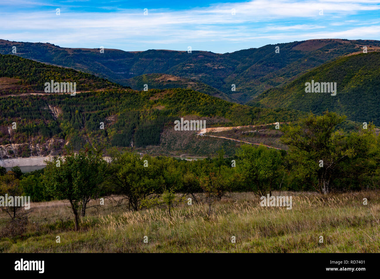 Beautiful nature that surrounding the Zavoj Lake, high mountain ranges of Old mountain ( Stara planina ) in background Stock Photo