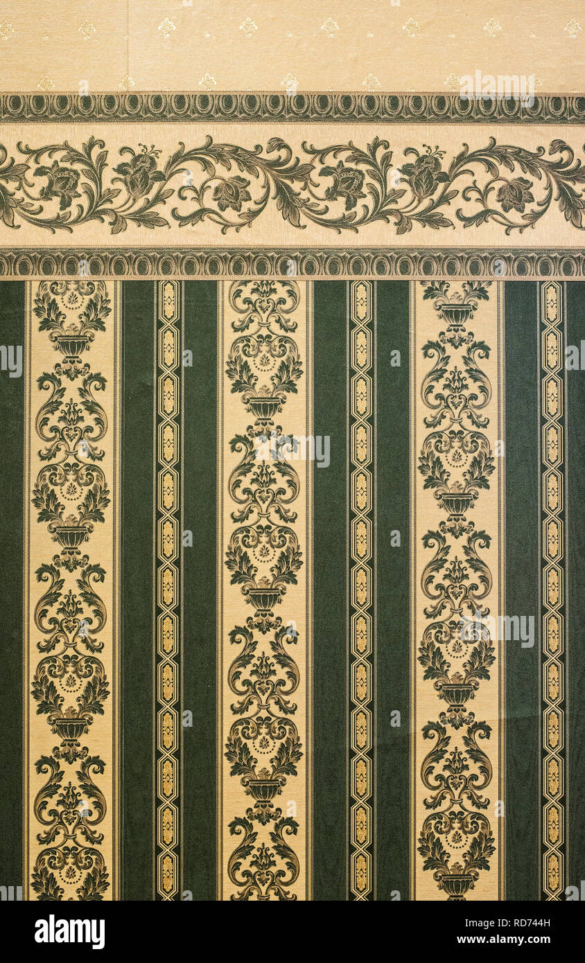 Vintage ornamental green patterns wallpaper. Victorian style backdrop.  Natural authentic light Stock Photo - Alamy