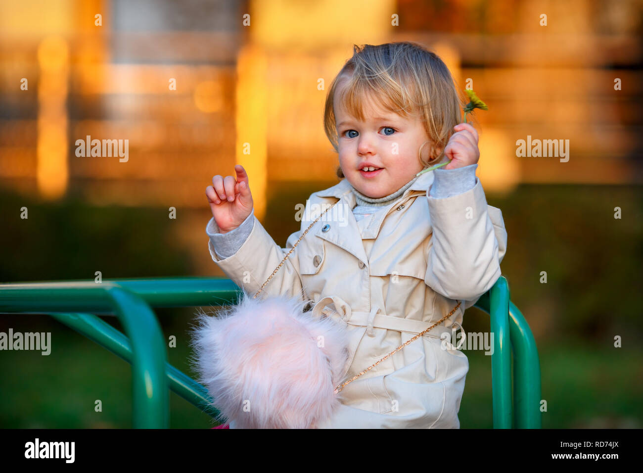 baby in a trenchcoat
