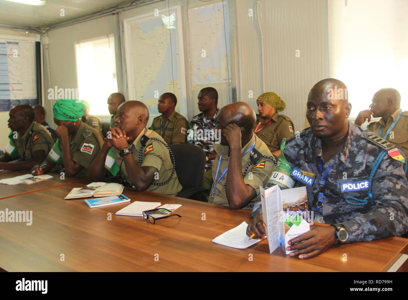 AMISOM Police Officers attending a briefing in Mogadishu ahead of their deployment in Adaado and Jowhar to help secure the electoral process. (29874192953). Stock Photo