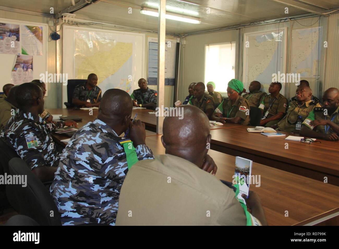 AMISOM Police Officers attending a briefing in Mogadishu ahead of their deployment in Adaado and Jowhar to help secure the electoral process. (30419712341). Stock Photo