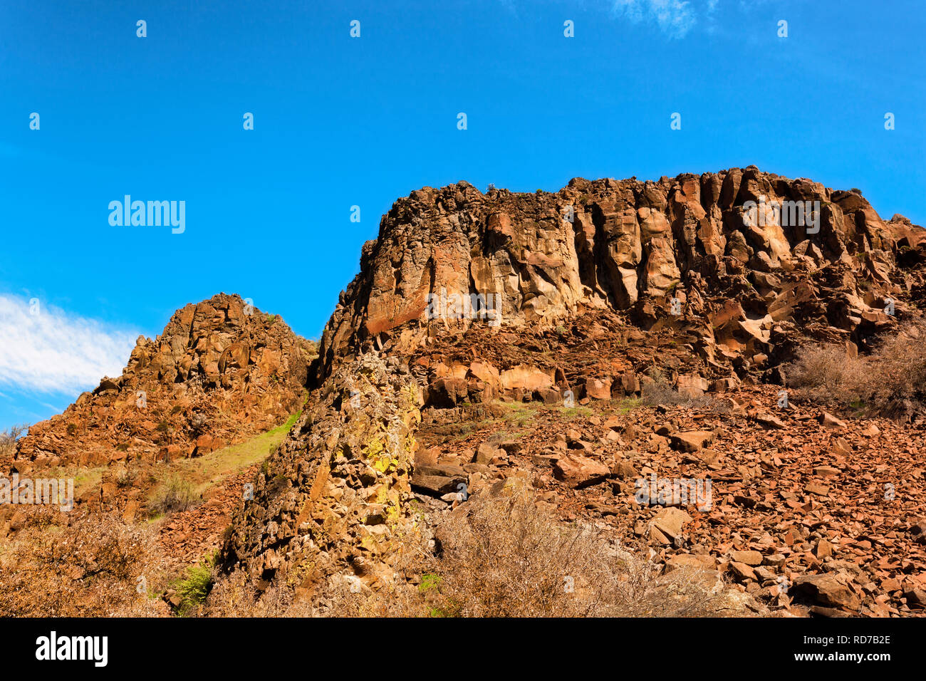Looking up at ridge from White River Canyon in Oregon's high desert landscape Stock Photo