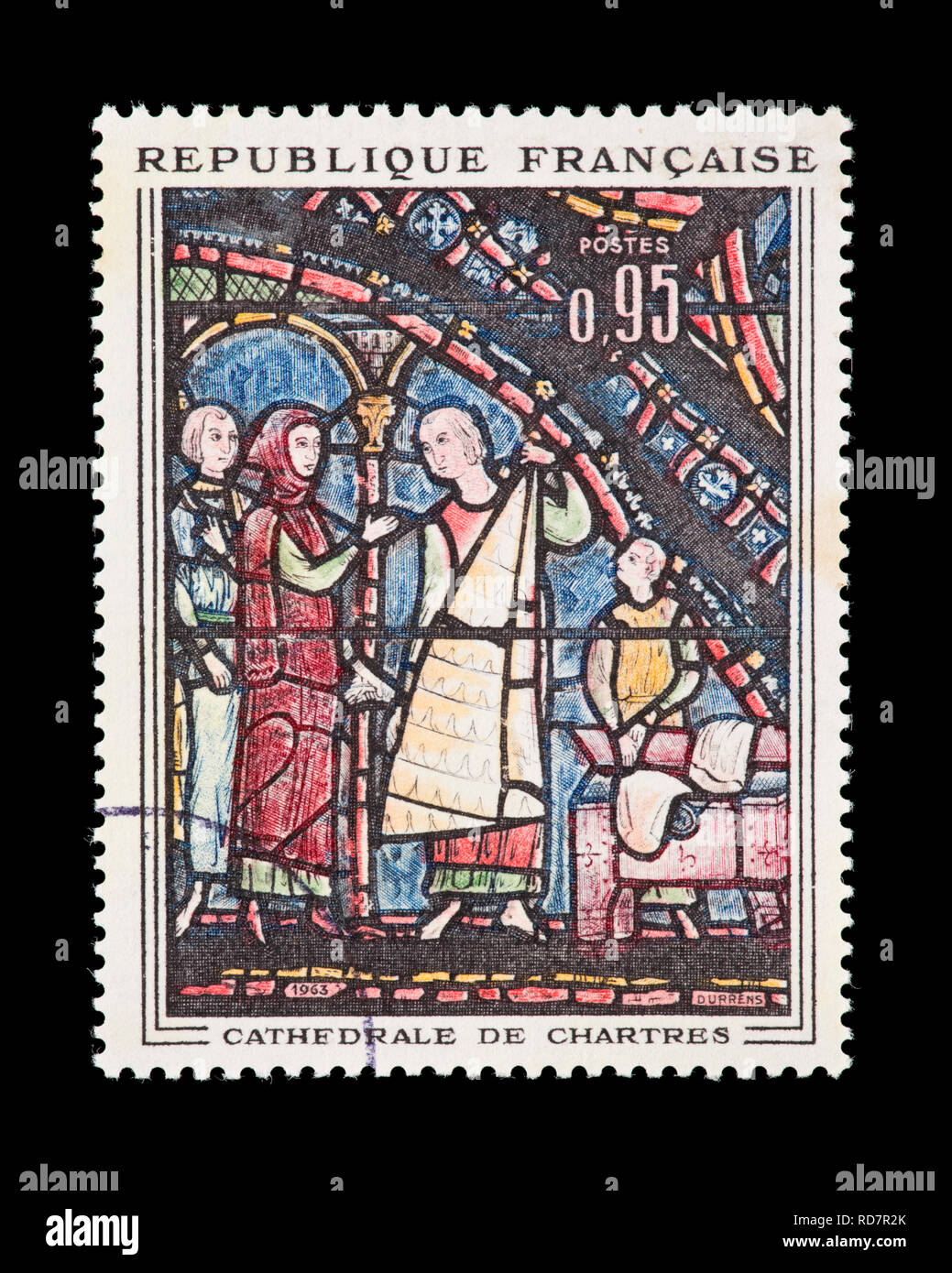 Postage stamp from France depicting the stained glass mosaic 'The Fur Merchants' from Chartres Cathedral. Stock Photo