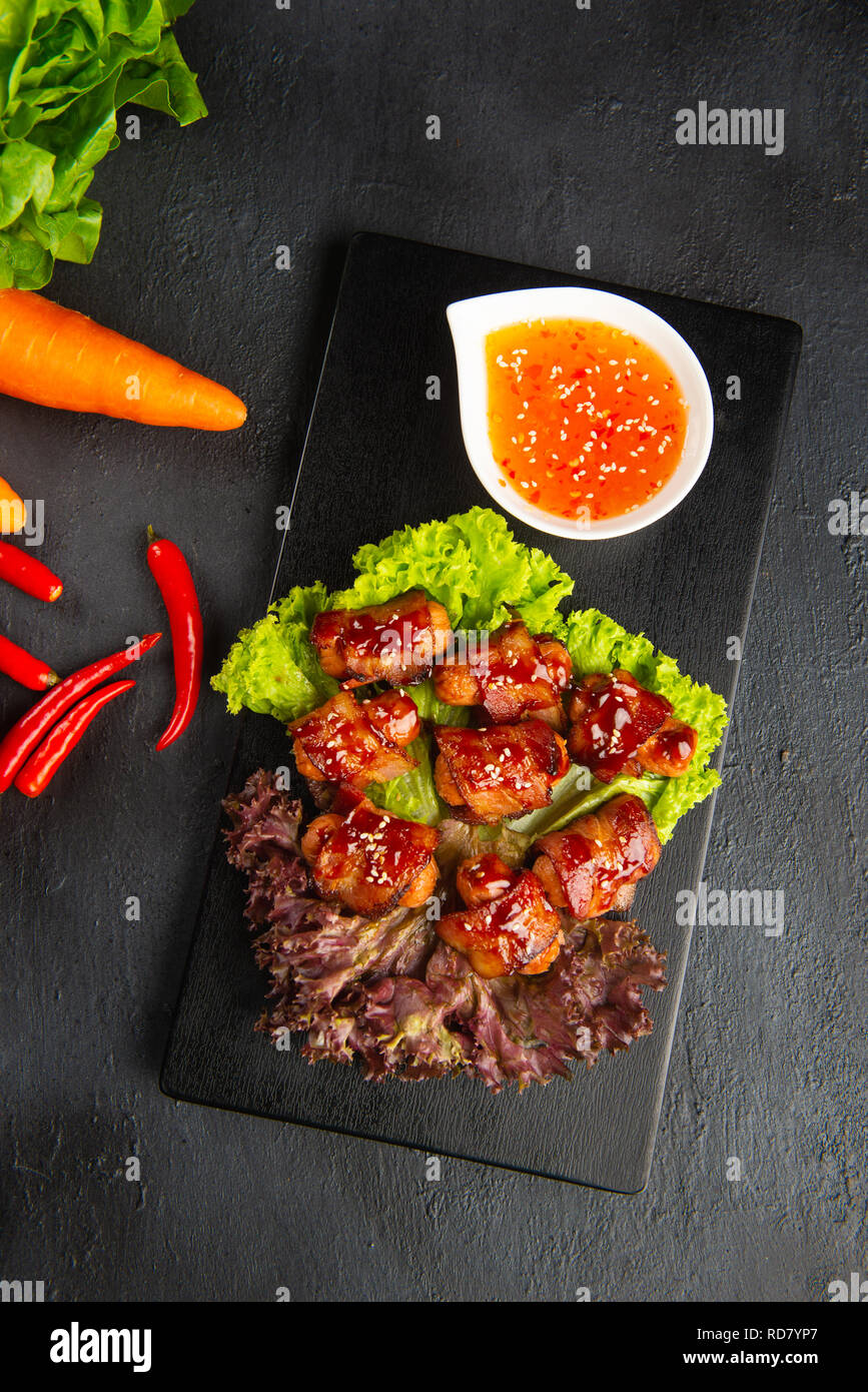 Pigs in Blankets Sausages wrapped in bacon. Traditional British