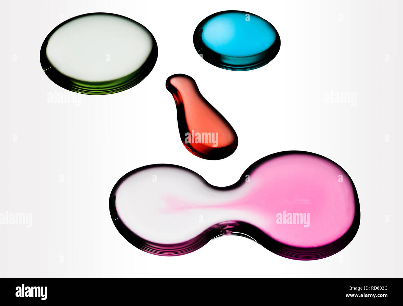 Colorful rounded pieces of glass on white background Stock Photo