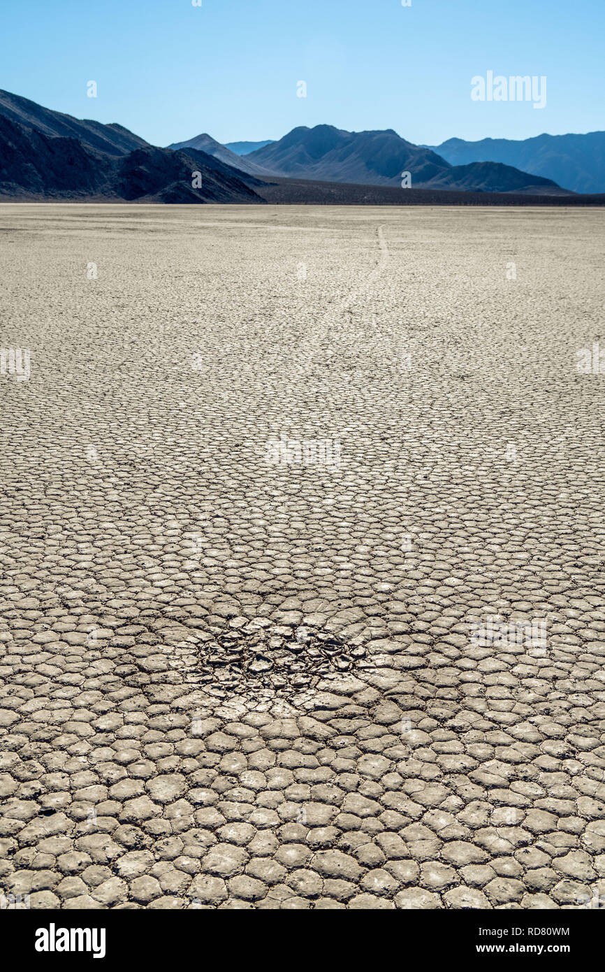 A strange depression and a track, might have been left over by an object that disappeared, Racetrack Playa, Death Valley National Park, California Stock Photo