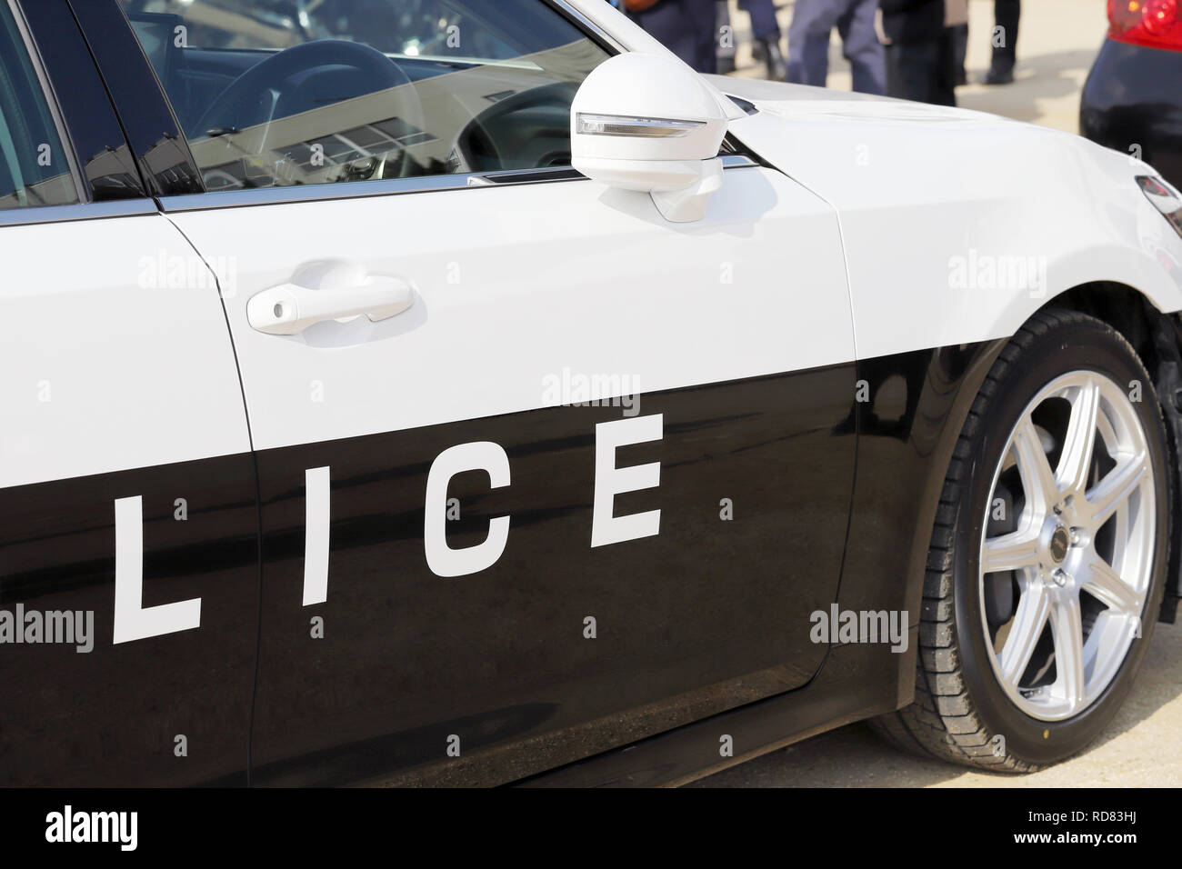 Closeup of the body of the Japanese police car with a sign POLICE Stock Photo