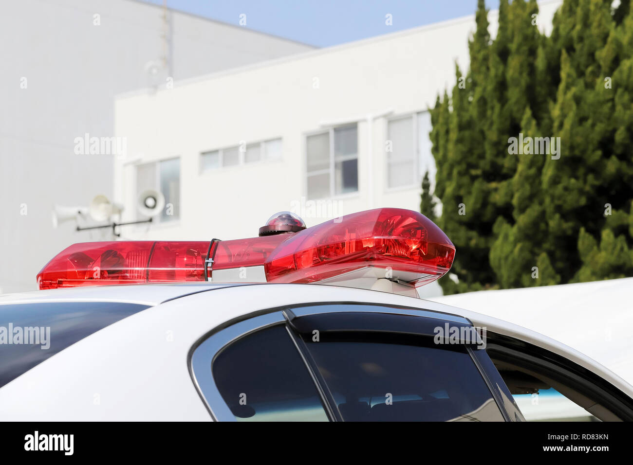 Closeup of the body of the Japanese police car with a sign POLICE Stock Photo